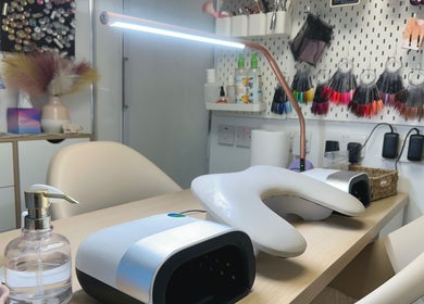 Elegant nail studio setup at HCM Nails in Falmouth, England, GB, featuring modern manicure equipment.