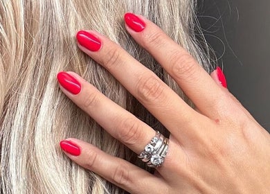 Elegant red manicure at Hannah Morant Nails, Falmouth, England, GB, showcasing stylish nail design.