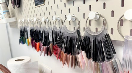 Nail polish samples at Nails by Hannah Morant in Falmouth, England, GB, showcasing diverse color options.