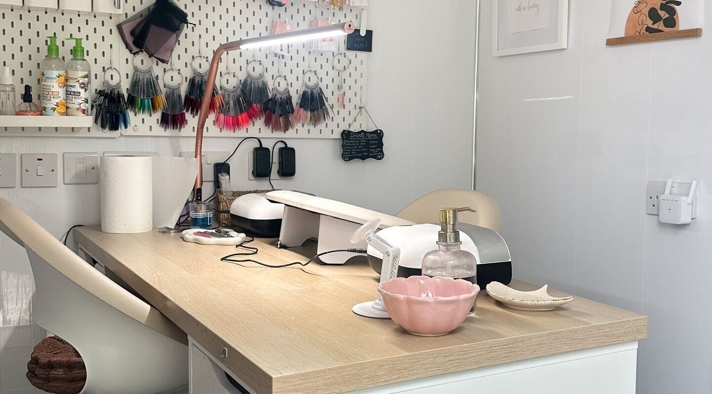 Modern nail station at Nails by Hannah Morant in Falmouth, England, GB, showcasing tools and stylish decor.