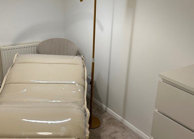 Peaceful treatment room at GB Hair & Beauty, Cowplain, England, GB, featuring cozy bed and elegant decor.