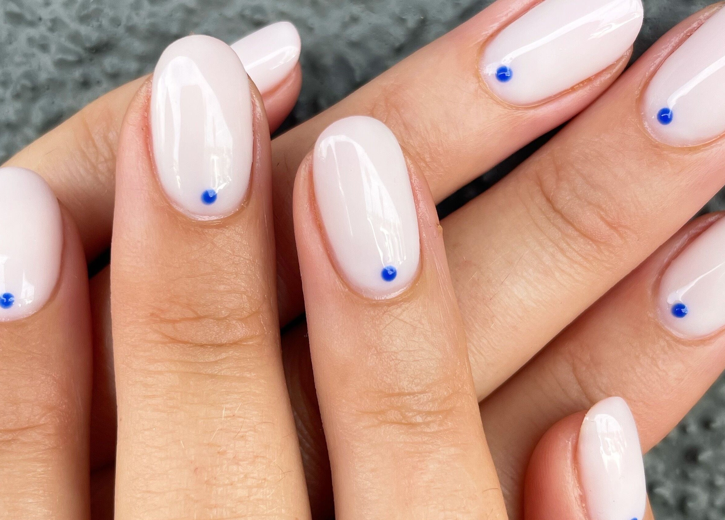 Elegant manicure with blue dot accents at Nails By Jamie, Applecross, Western Australia, AU.