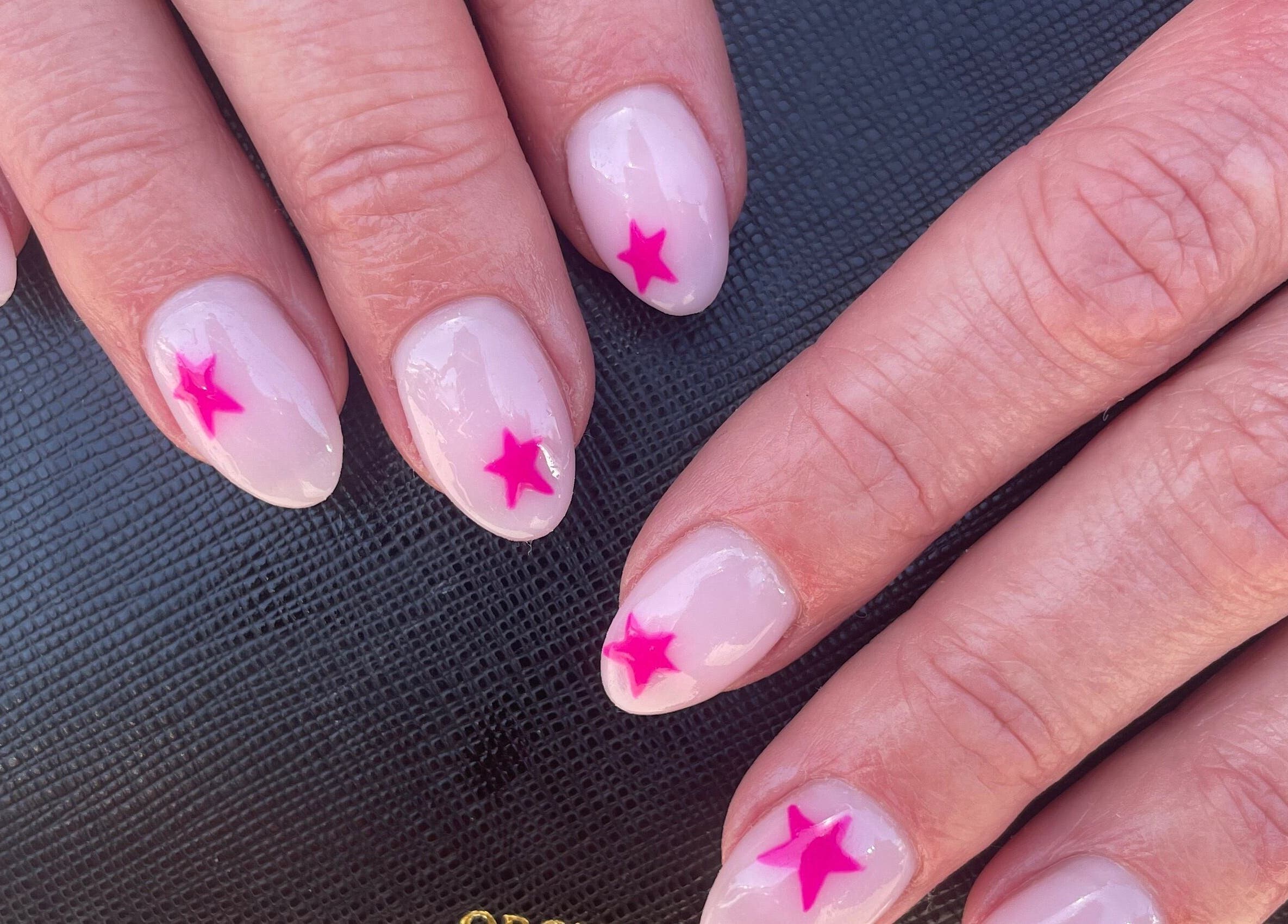 Pink star nail art at Nails By Jamie, Applecross, Western Australia, AU. Elegant and trendy design.