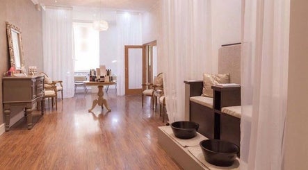 Luxurious interior of The Brookside Hair, Barber & Beauty Salon in Darwen, England, GB with elegant decor.