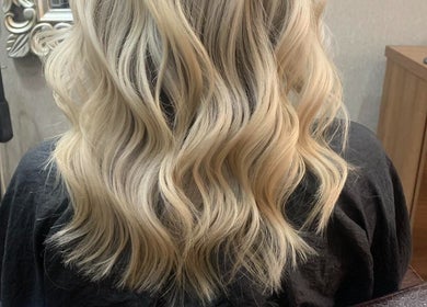 Blonde hair with soft waves styled at The Brookside Hair, Barber & Beauty Salon, Darwen, England, GB.