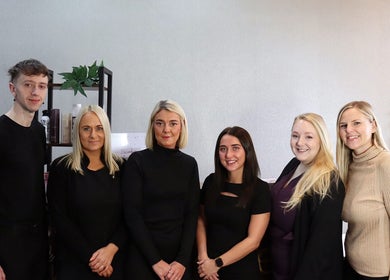 Friendly team at The Brookside Hair, Barber & Beauty Salon in Darwen, England, GB, ready to serve clients.