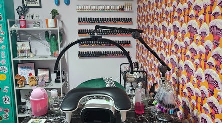 Colorful nail studio at Lucky Frog Nails, Newton Abbot, England, GB with vibrant decor and polish display.