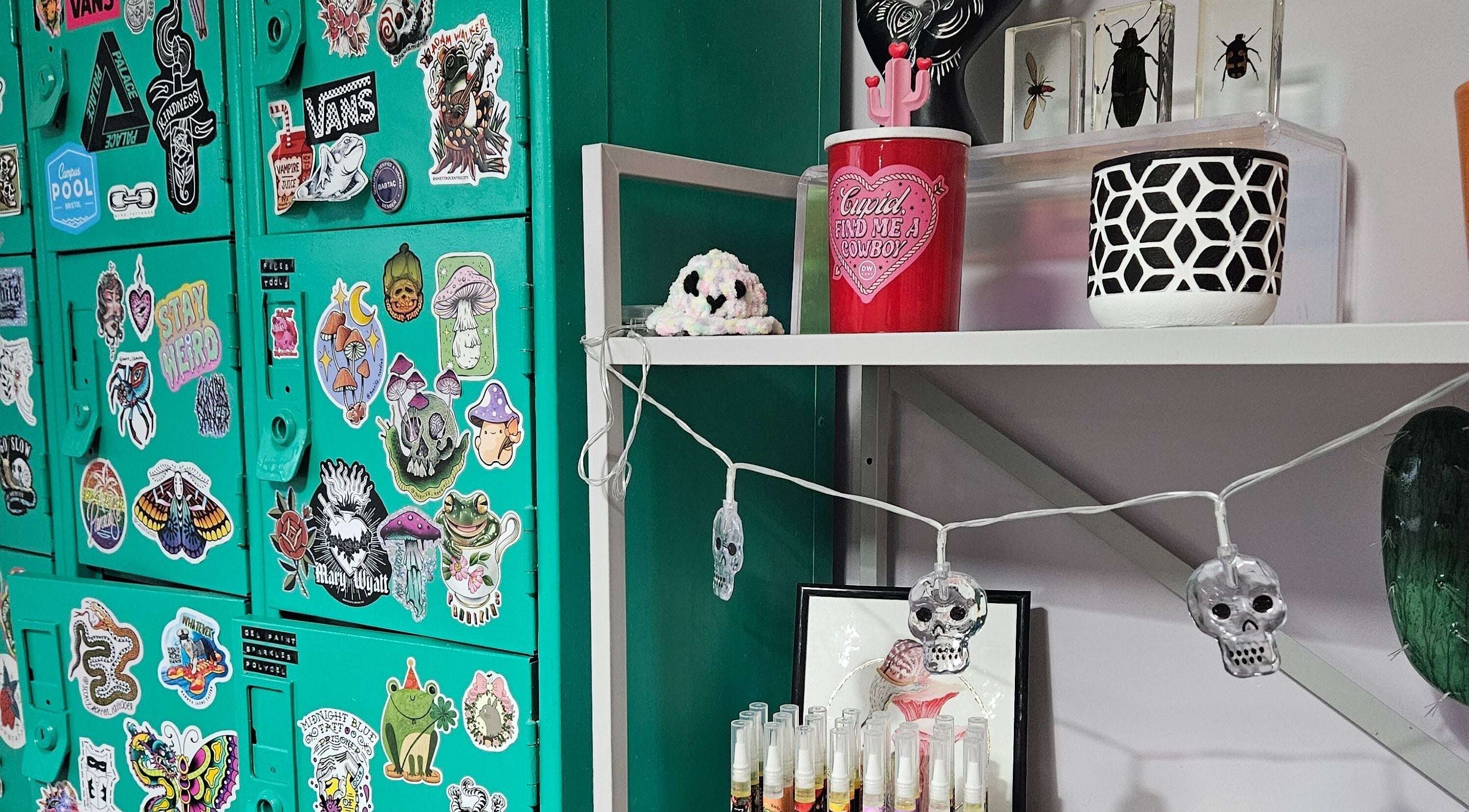 Eclectic sticker-covered lockers and decor at Lucky Frog Nails, Newton Abbot, England, GB.