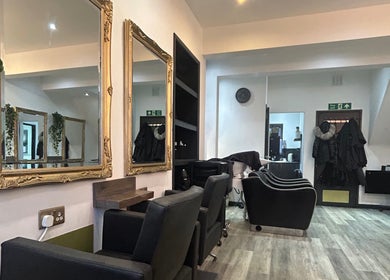 Gem Hair Design in Greenmount, England, GB features chic salon chairs and ornate mirrors for a luxurious experience.