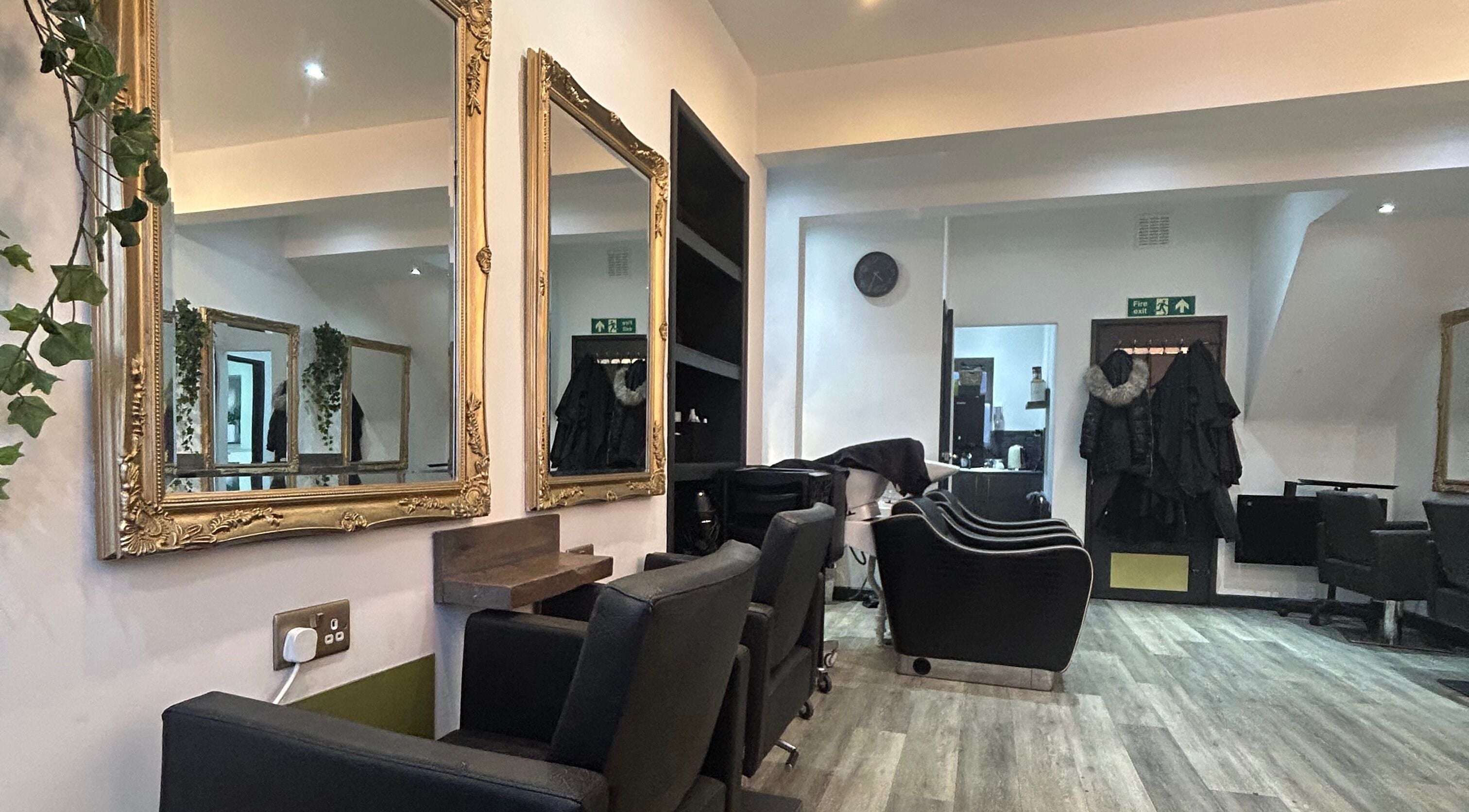 Gem Hair Design in Greenmount, England, GB features chic salon chairs and ornate mirrors for a luxurious experience.