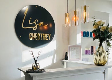 Elegant reception at Gem Hair Design, Greenmount, England, GB with chic decor and soft lighting.
