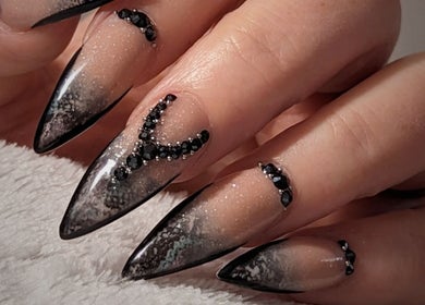 Elegant black crystal nail art at Kel's Nailz in Bristol, England, GB, showcasing luxury manicure styles.