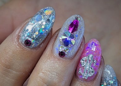Intricate gem nail art by Kel's Nailz in Bristol, England, GB showcasing vibrant colors and shimmering designs.