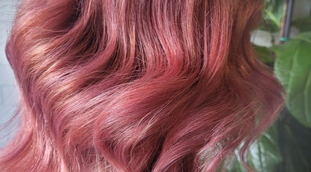 Vibrant pink hair waves at Sophrosyne Hair Artistry & Serene Beauty in Toowoomba City, Queensland, AU.