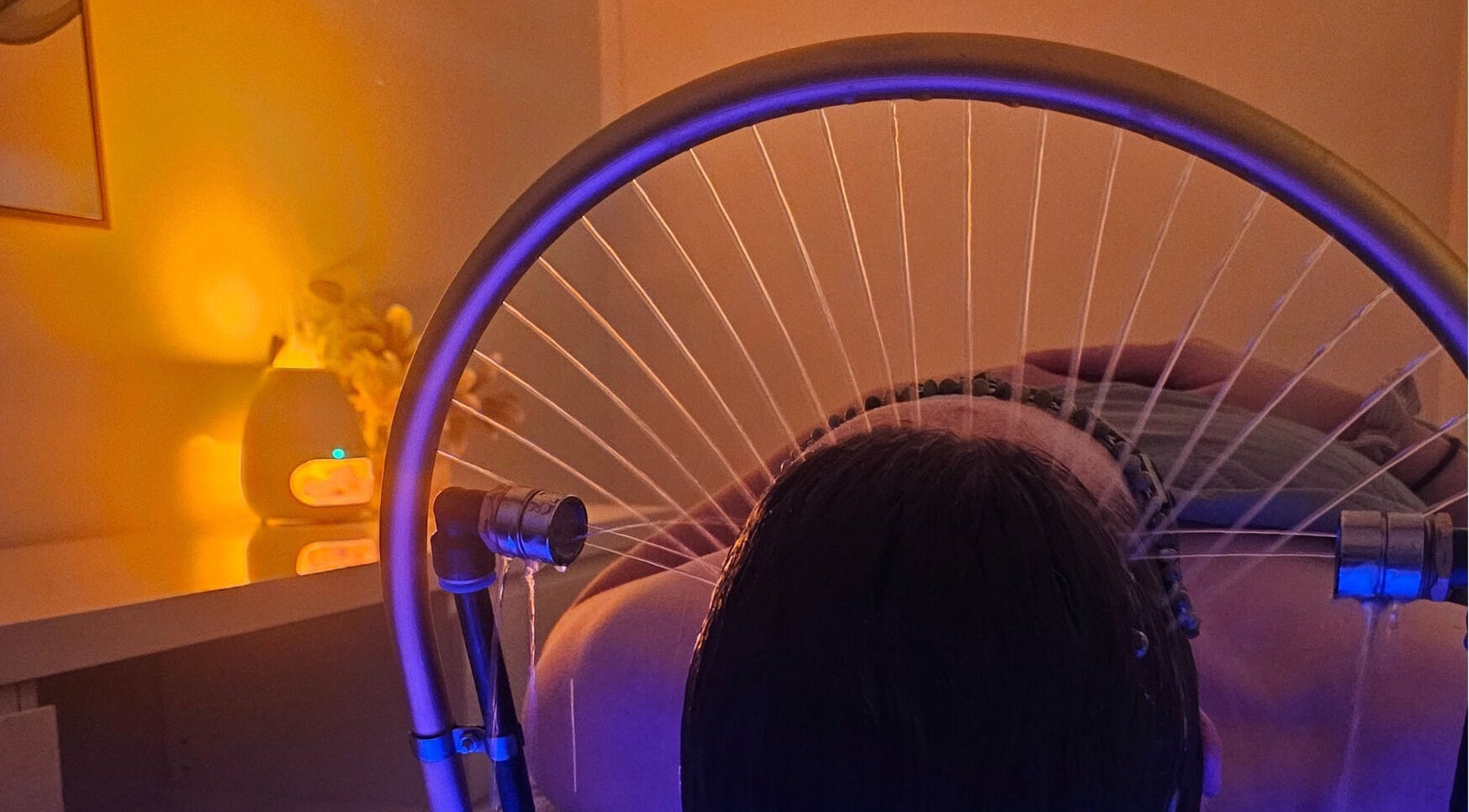 Relaxing head spa treatment with water jets at Sophrosyne Hair Serenity Studios, Toowoomba City, Queensland, AU.