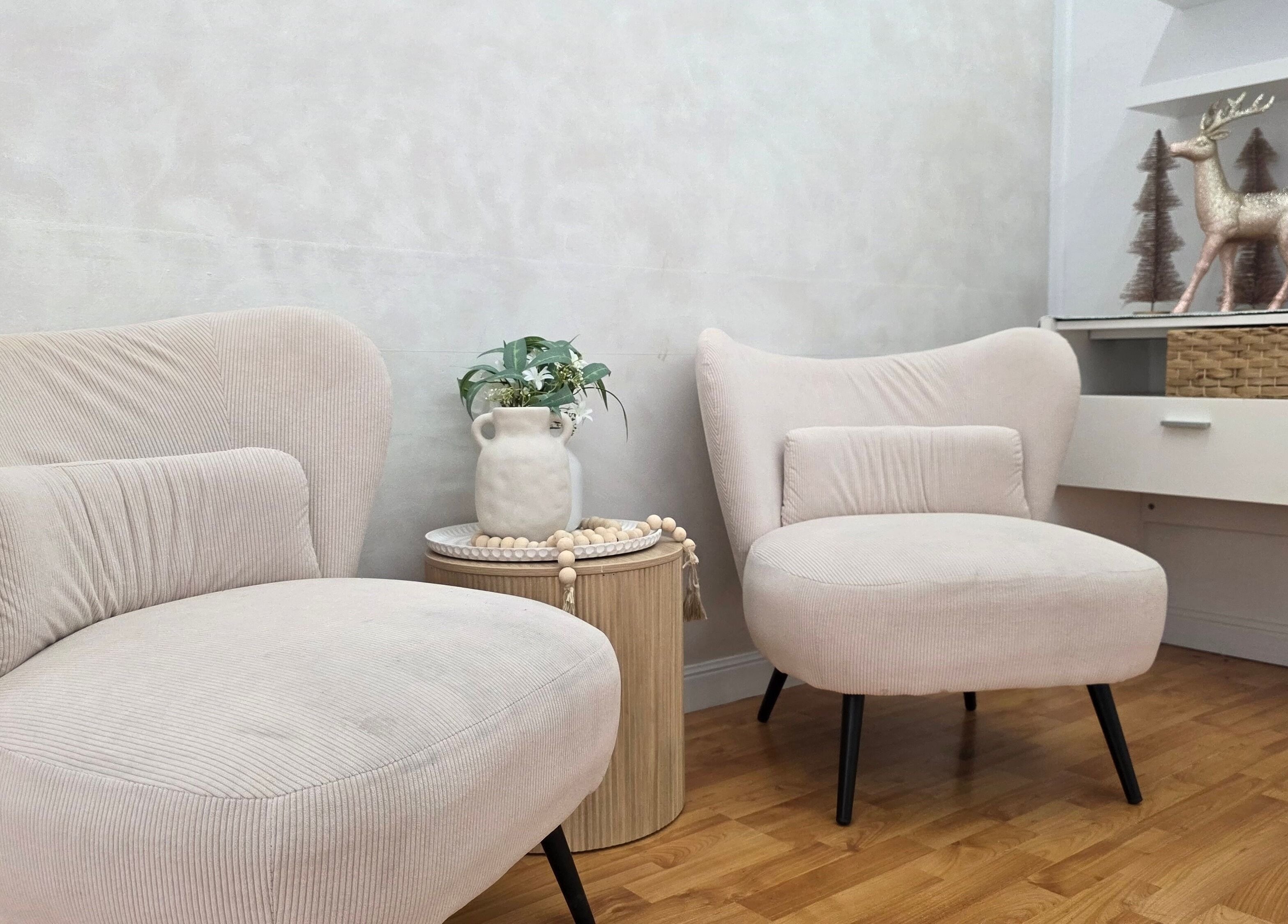 Relaxing seating area at Sophrosyne Hair Serenity Studios, Toowoomba City, Queensland, AU with elegant decor.