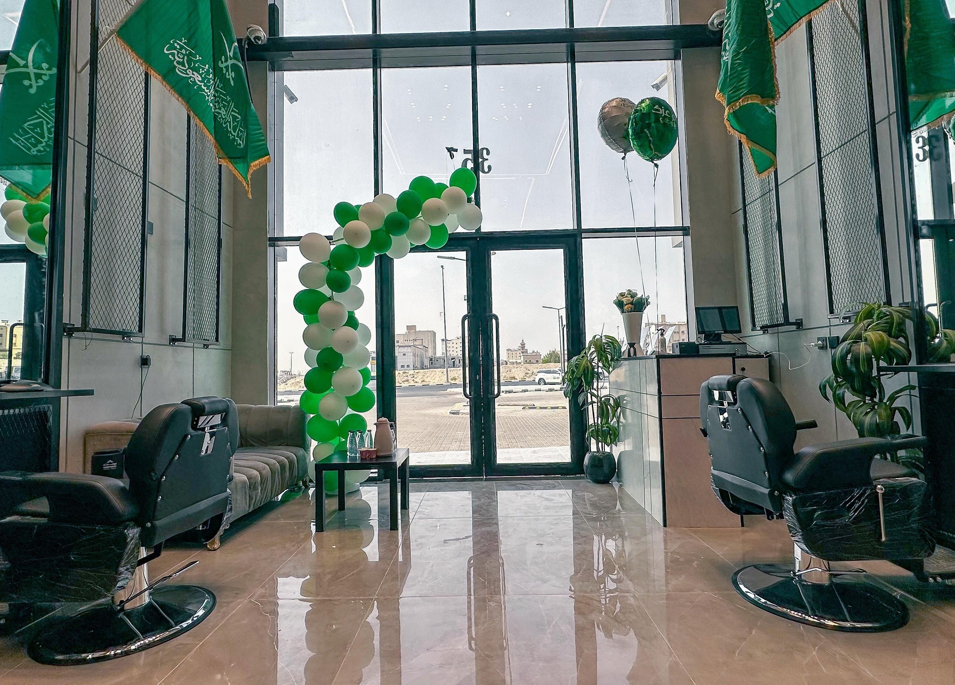 Interior of 1/2 Cuts Salon صالون هاف كت | Al Dammam with stylish chairs and decor in Dammam, Eastern Province, SA.