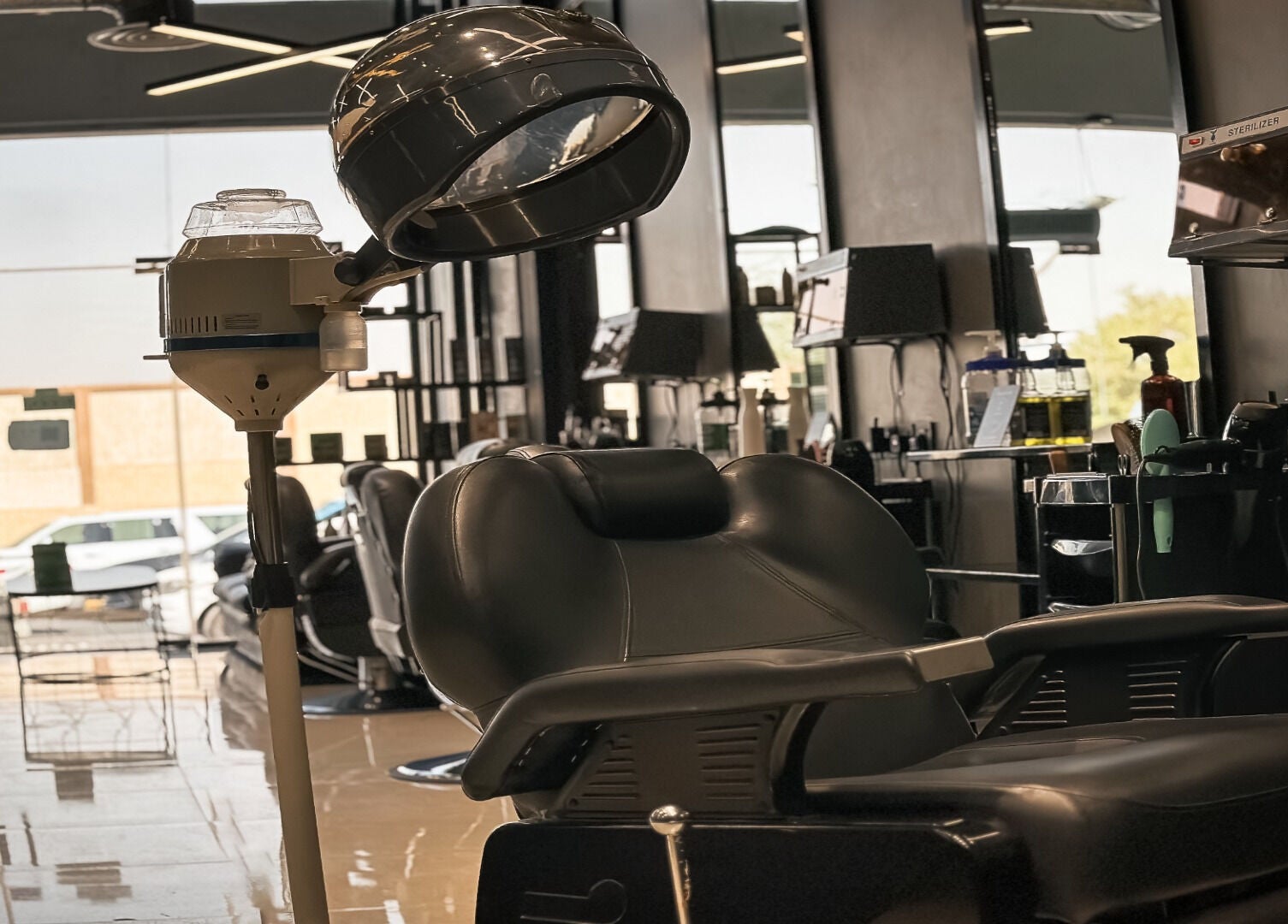 Modern salon interior with sleek styling chair at 1/2 Cuts Salon صالون هاف كت | Al Shifa, Riyadh, Riyadh Province, SA.