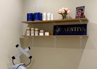 Product shelves at Aestiva clinic Ebbsfleet in Ebbsfleet Valley, England featuring beauty products and decor.