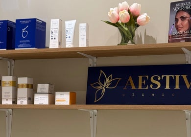 Skincare products on wooden shelves at Aestiva clinic Ebbsfleet in Ebbsfleet Valley, England, GB.