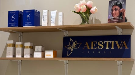 Skincare products on wooden shelves at Aestiva clinic Ebbsfleet in Ebbsfleet Valley, England, GB.
