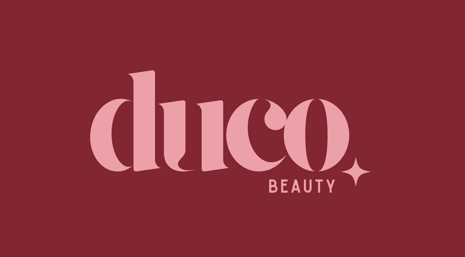Duco Beauty logo in elegant pink on maroon background, Herne Hill, Victoria, AU.