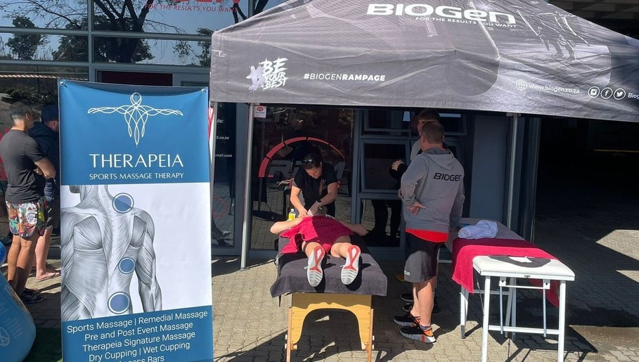 Therapeia Sports Massage in Sandton, Gauteng, ZA, offering outdoor sports massage therapy under gazebo.