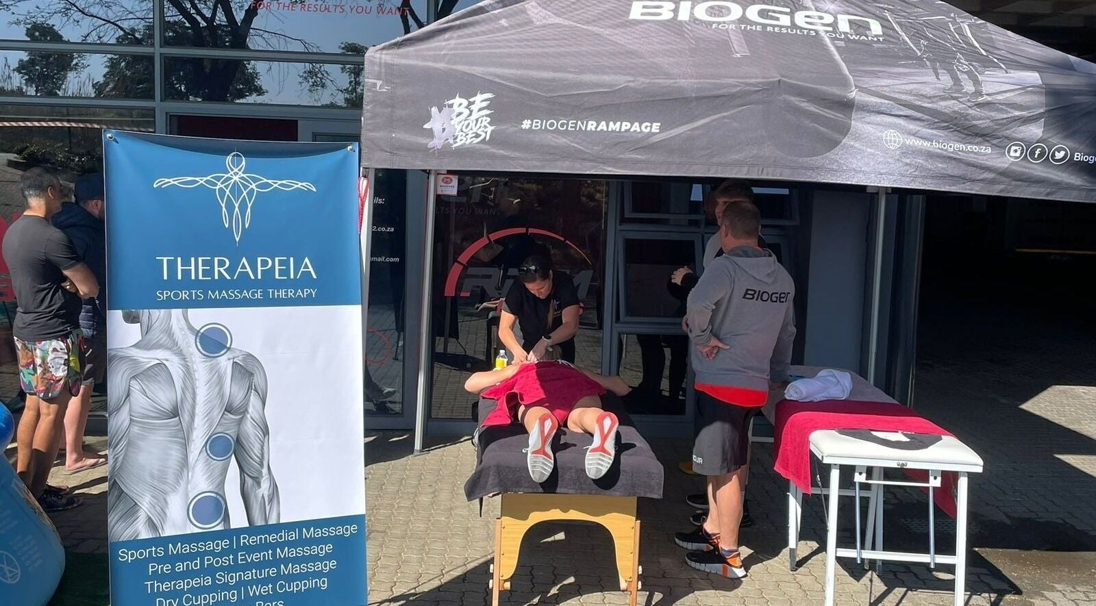 Therapeia Sports Massage in Sandton, Gauteng, ZA, offering outdoor sports massage therapy under gazebo.