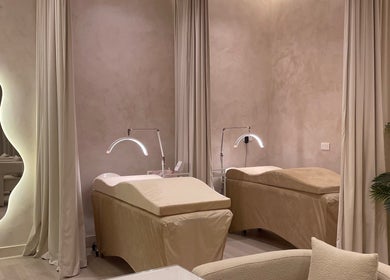 Luxurious treatment beds at LBK Paris Beauty Salon, Dubai, AE, offering serene spa experiences.