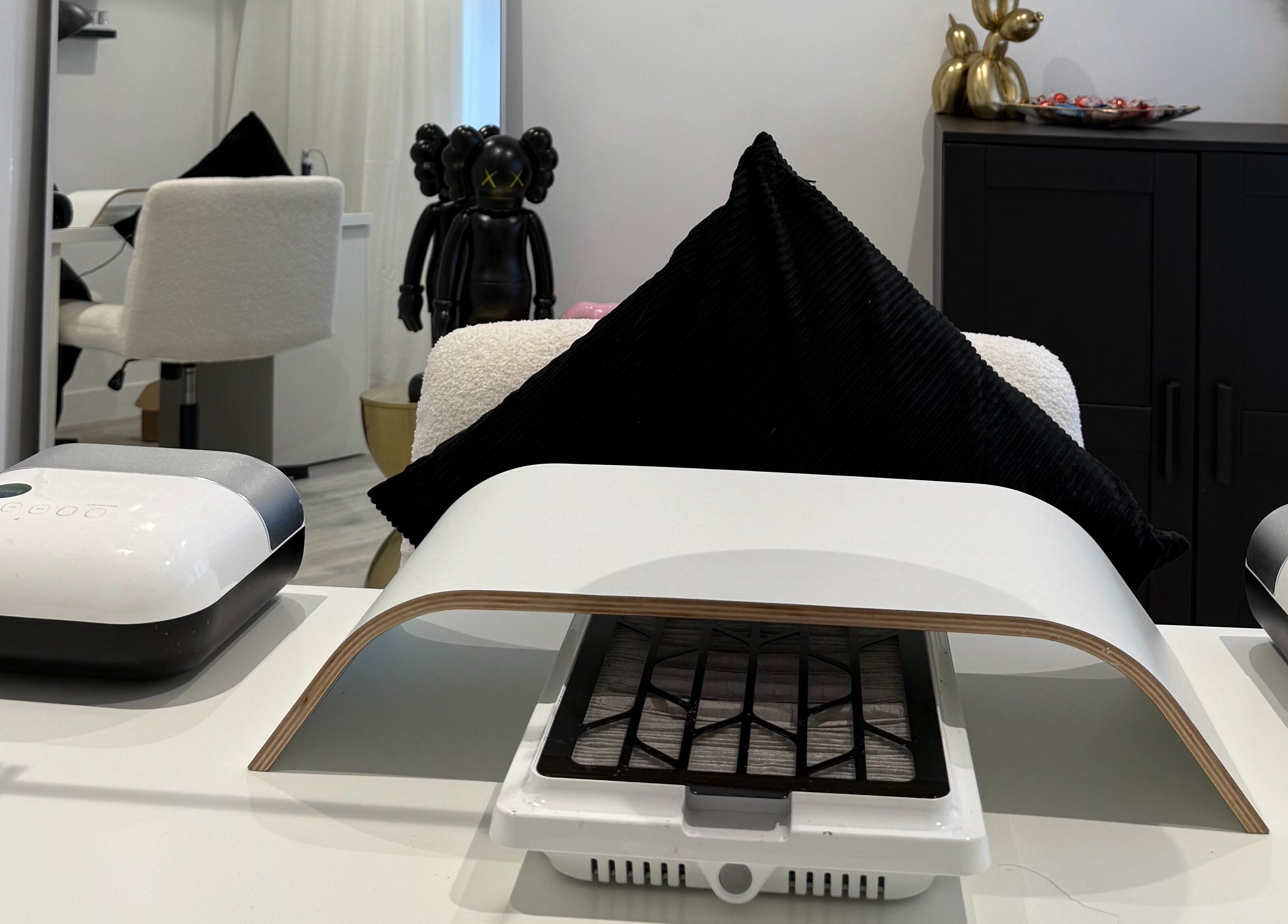 Elegant nail station at Ell Nail Edit, Birmingham, England, GB with modern equipment and stylish decor.