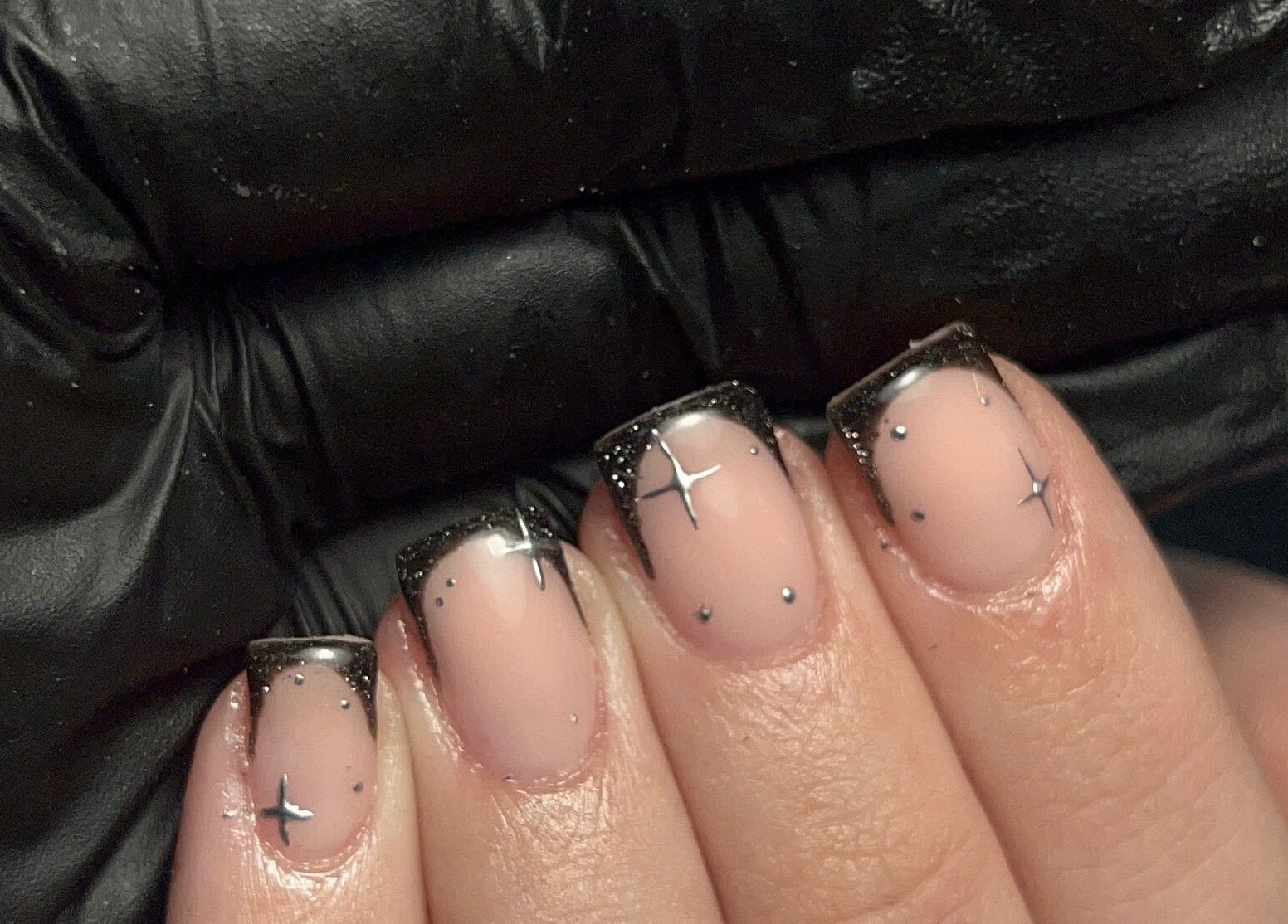 Elegant black and silver nail art at Ell Nail Edit, Birmingham, England, GB.