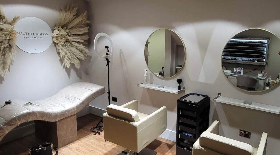 Stylish salon space at Hair By Nicola in Chorley, England, GB with modern chairs and a serene ambiance.