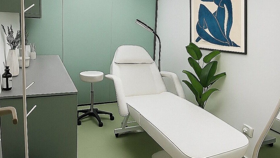 Modern treatment room at Dejavu Lashes, London, England, GB with a stylish chair and calming decor.