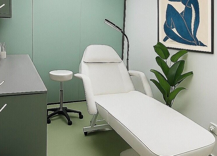 Modern treatment room at Dejavu Lashes, London, England, GB with a stylish chair and calming decor.