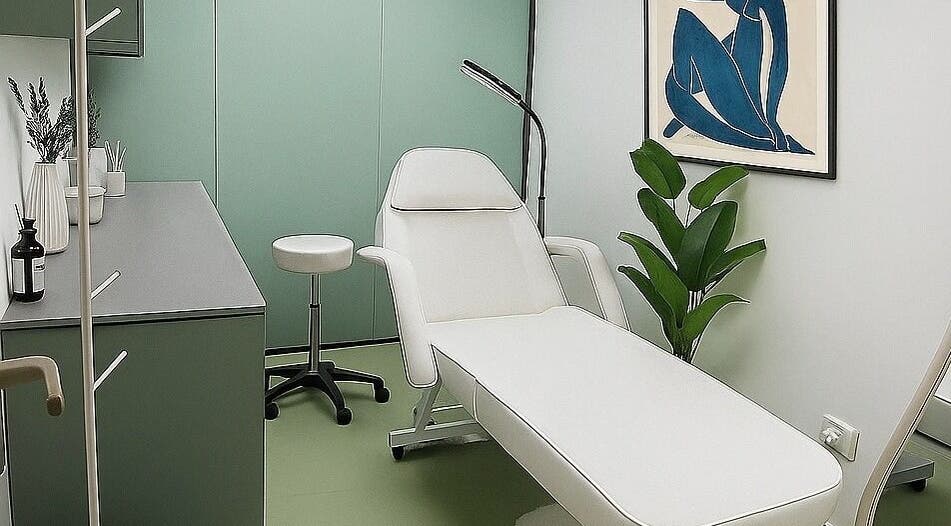 Modern treatment room at Dejavu Lashes, London, England, GB with a stylish chair and calming decor.