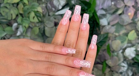 Elegant pink glitter nails at Koolelo X Get Nailed Academy, Zürich, Zürich, CH, set against lush greenery.