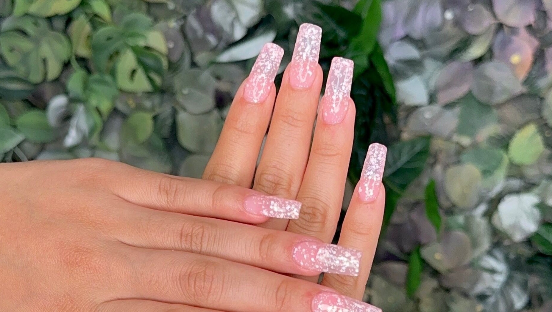 Elegant pink glitter nails at Koolelo X Get Nailed Academy, Zürich, Zürich, CH. Perfect for a stylish look.