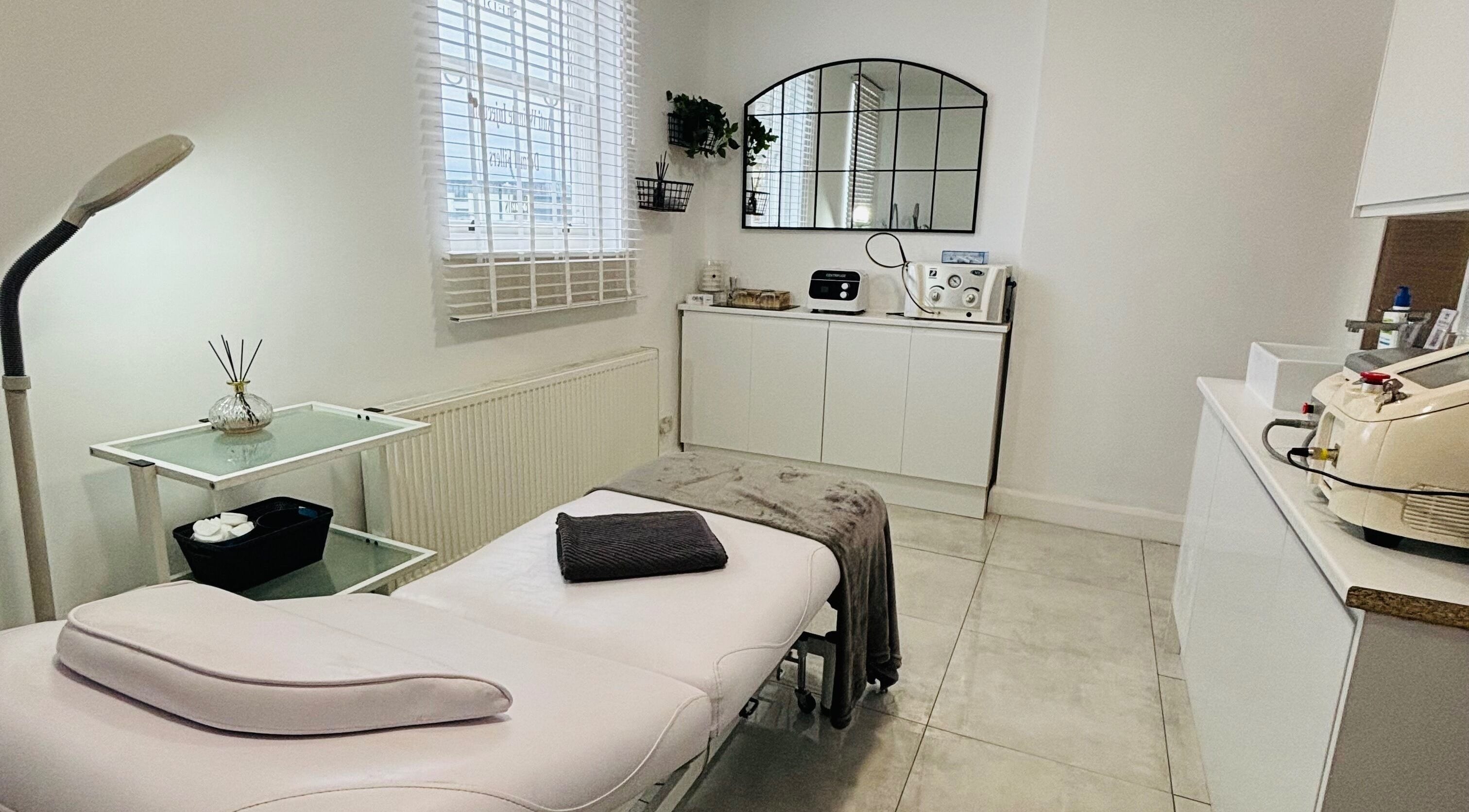 A tranquil treatment room at Another Level Medispa, Chelmsford, England, GB, showcasing a modern spa setup.