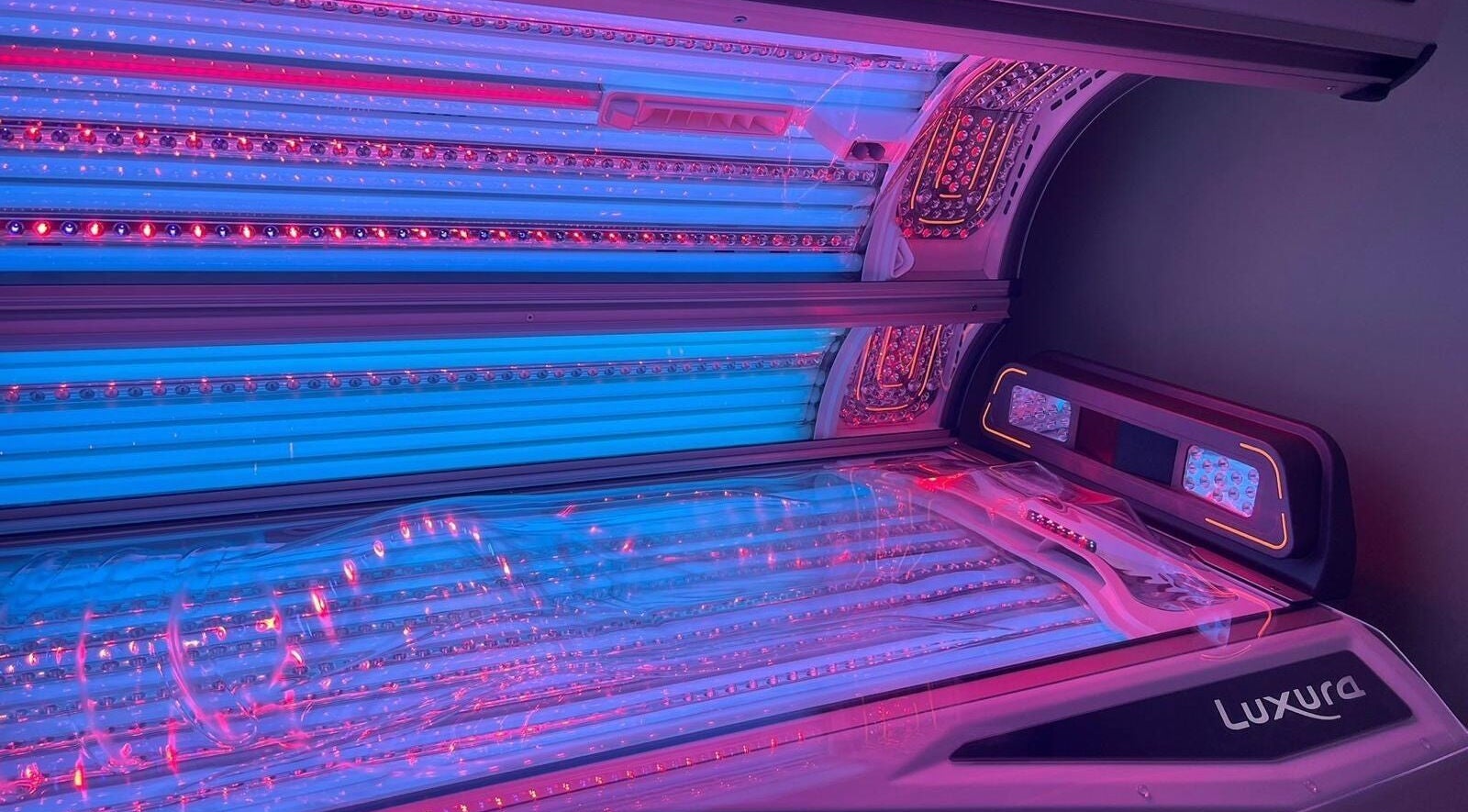 Tanning bed at Utopia Wymondham, Wymondham, England, GB, showcasing advanced LED lights for a premium tanning experience.
