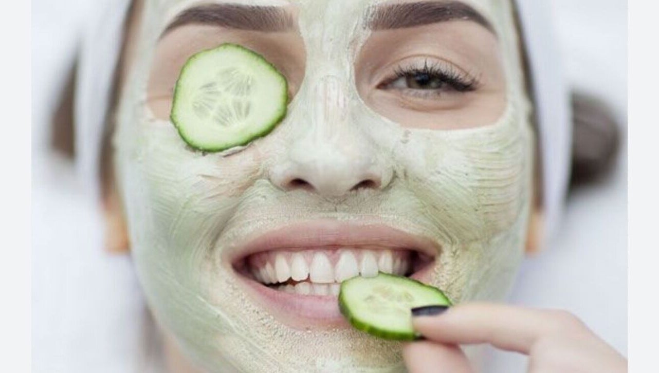 Woman enjoying a cucumber facial at Serene Esthetics, Surrey, British Columbia, CA.