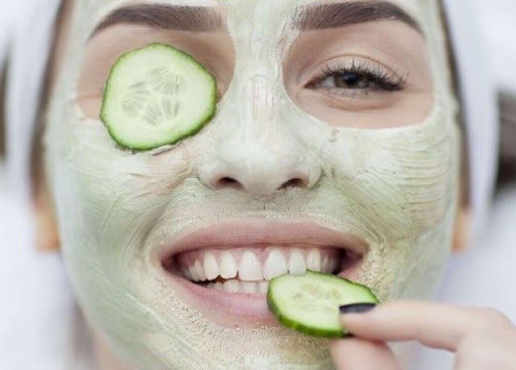 Woman enjoying a cucumber facial at Serene Esthetics, Surrey, British Columbia, CA.
