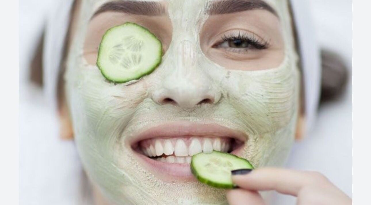 Woman enjoying a cucumber facial at Serene Esthetics, Surrey, British Columbia, CA.
