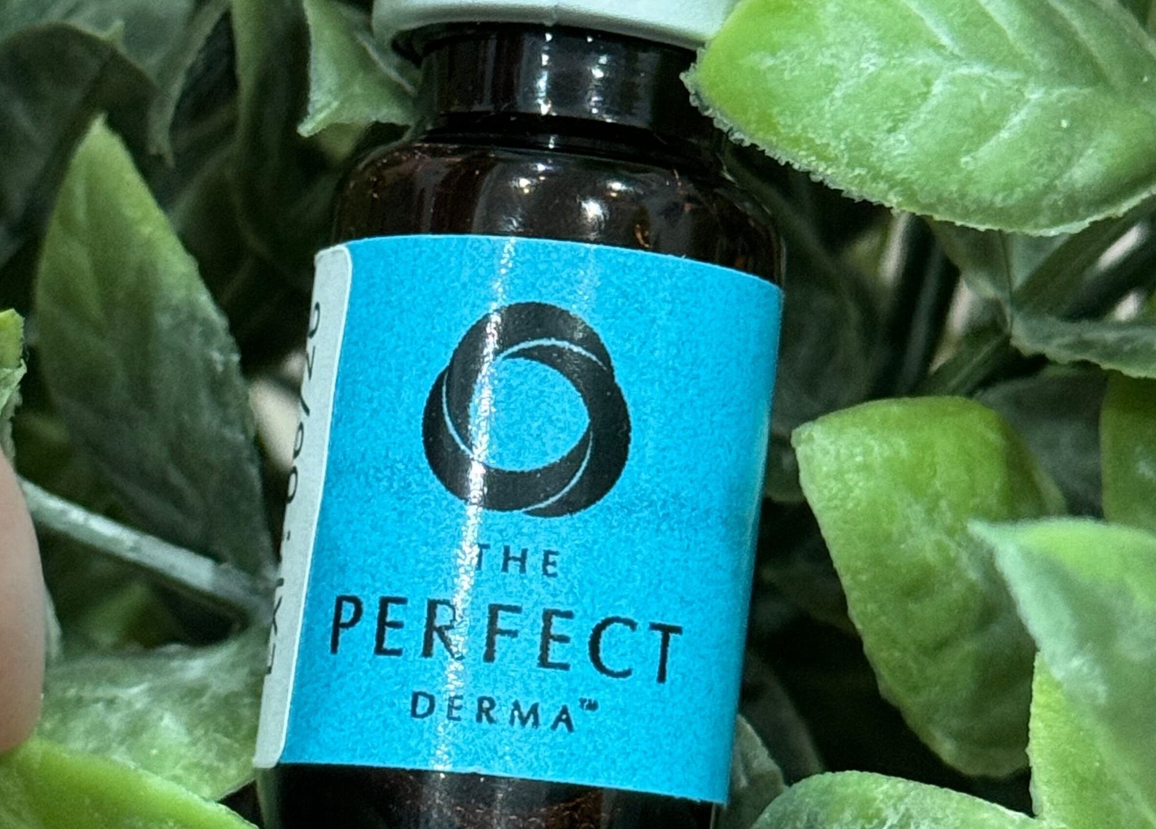 Close-up of a skincare bottle in a leafy setting at Serene Esthetics, Surrey, British Columbia, CA.