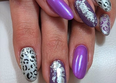 Vibrant purple and silver nail art at Nails and Beauty by Liz B, Barnsley, England, GB.