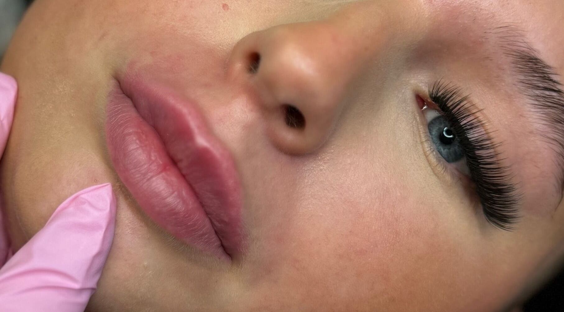 Close-up of enhanced lashes and lips at Olive Skin & Aesthetics, Birmingham, England, GB.