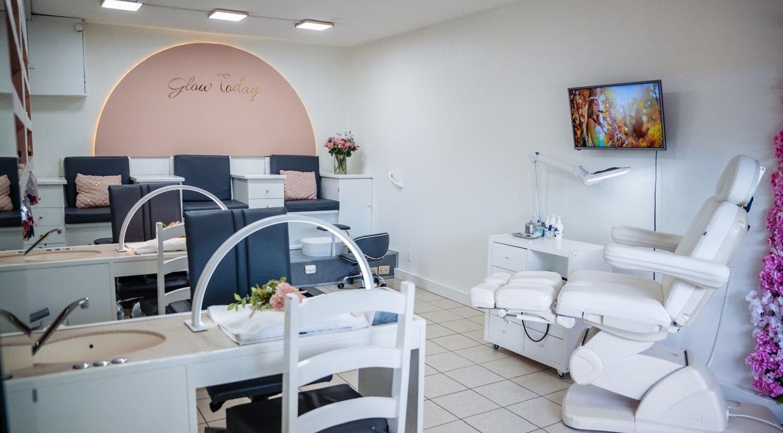Calming spa interior at Pure Essence Spa, Kralendijk, Bonaire, BQ with luxurious seating and floral decor.