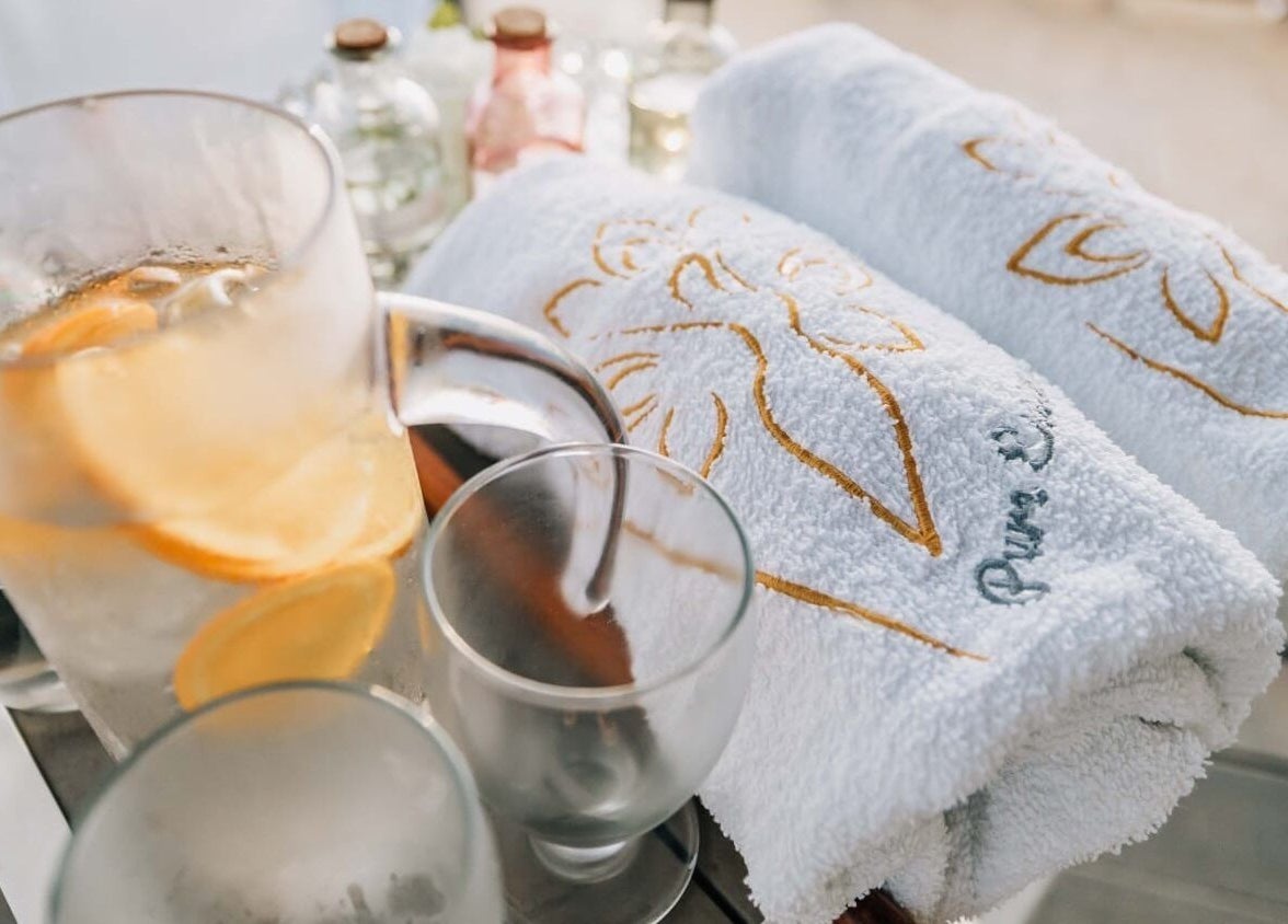 Refreshing citrus drink with towels at Pure Essence Spa, Kralendijk, Bonaire, BQ.