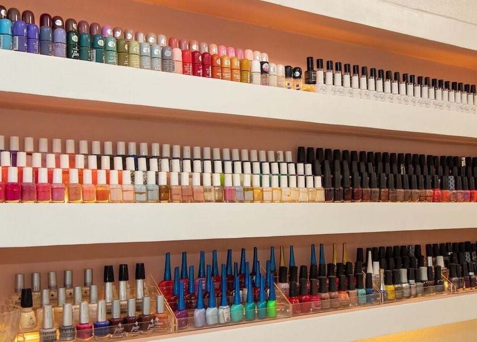 Vibrant nail polish collection at Pure Essence Spa, Kralendijk, Bonaire, BQ.