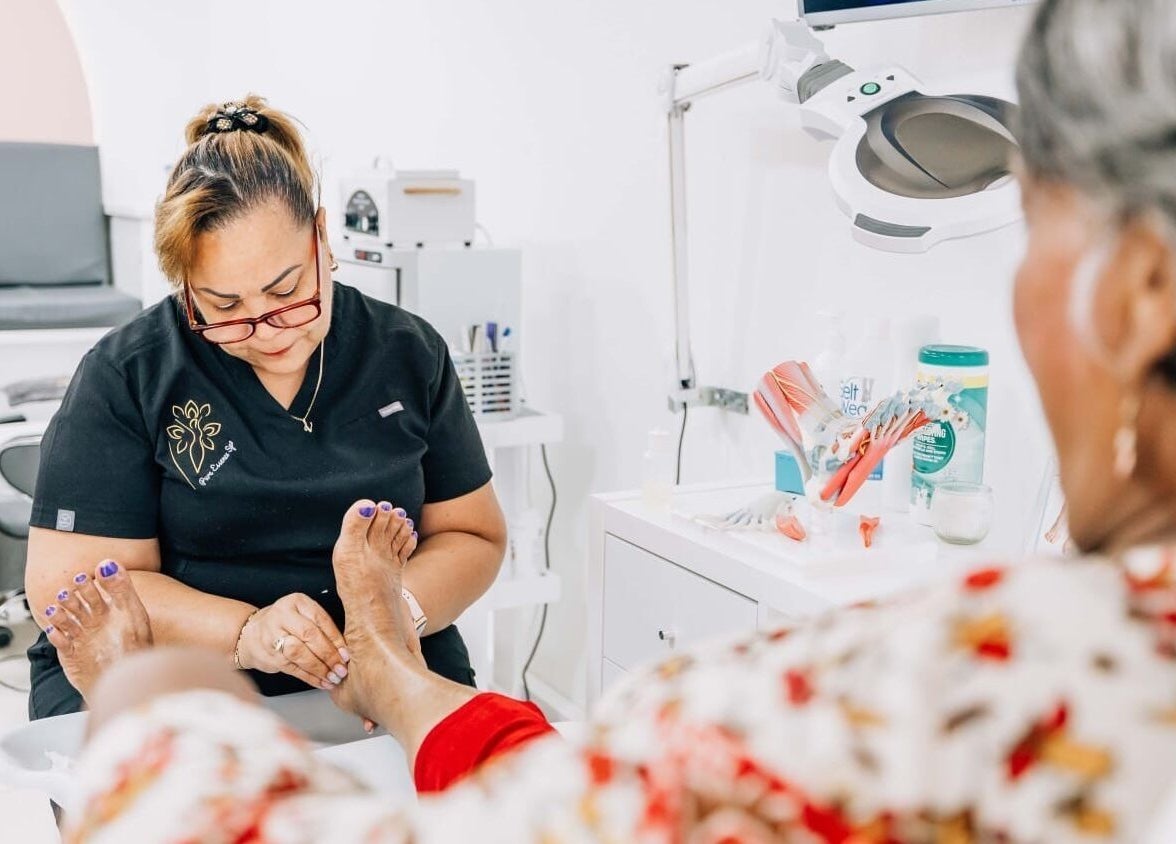A technician at Pure Essence Spa in Kralendijk, Bonaire, BQ, provides a calming pedicure treatment.