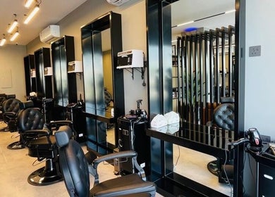 Modern barber chairs at The Address Barber | صالون العنوان النزهة, Riyadh, Riyadh Province, SA.